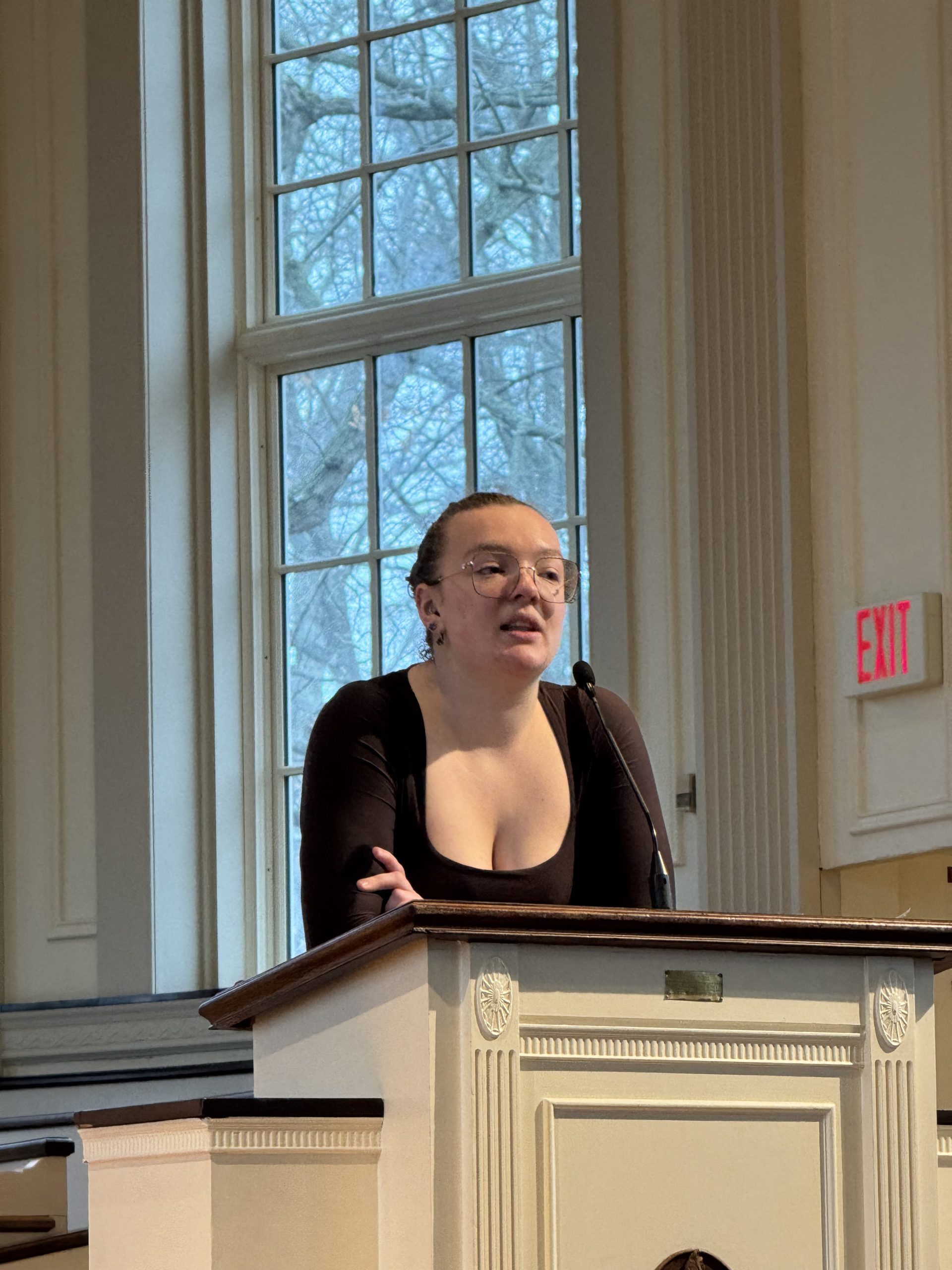 Lily Nestich speaking at community reflection