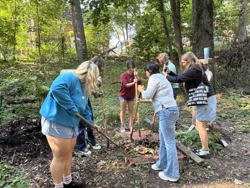 ESC Students composting in the Grove