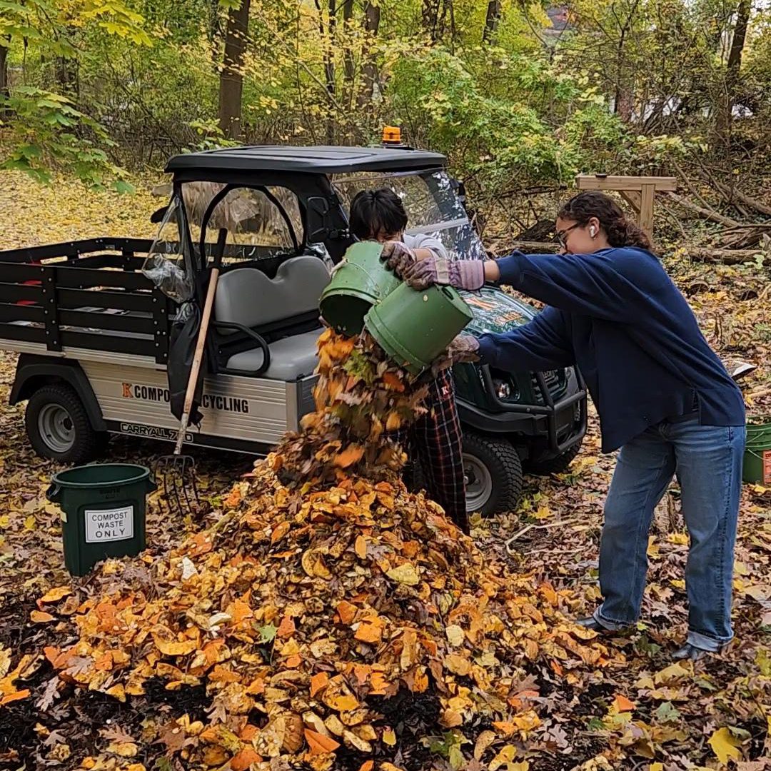 Miyani Sonera and Rubi Gonzalez composting pumpkins